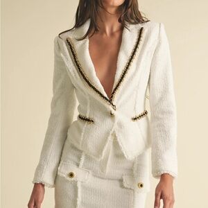 Elegant White Blazer with Black and Gold Details